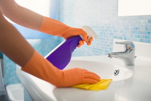 Weekly sofa cleaning routine with vacuuming and cushion care